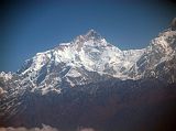 Annapurna 15 03 Manaslu Southwest Face On Flight From Pokhara To Kathmandu I then switched to Cosmic Air (it's got a nice ring to it, don�t you think), and once again passed the Southwest face of Manaslu on the flight from Pokhara to Kathmandu.